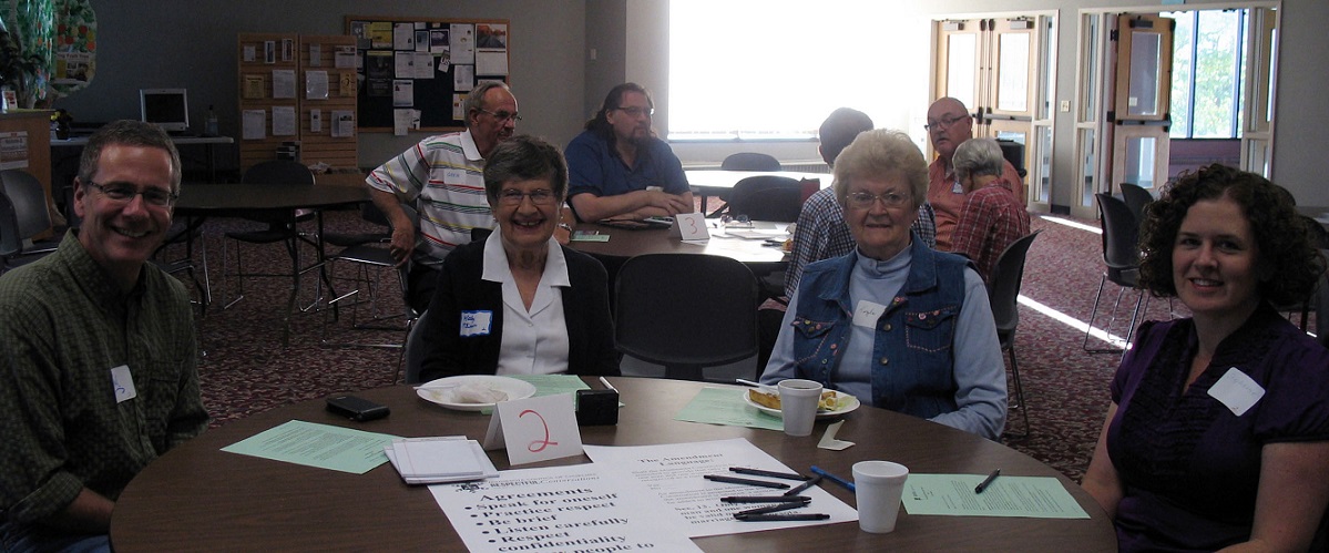 People sitting around tables